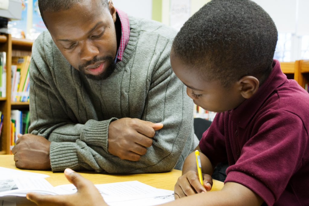 _DSC0414 Literacy Lab tutor working with second grade student