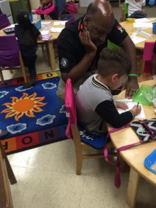 Literacy Lab tutor practicing handwriting with a Pre-K student