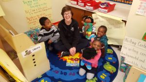 Literacy Lab tutor Kara Korab with Pre-K students in Baltimore