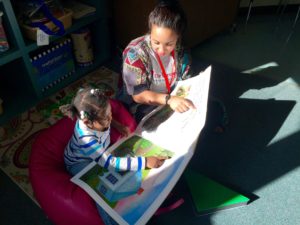 KC Literacy Lab tutoring reading with a student